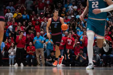 Tyson Degenhart Dribbles Ball Up Court Against New Mexico