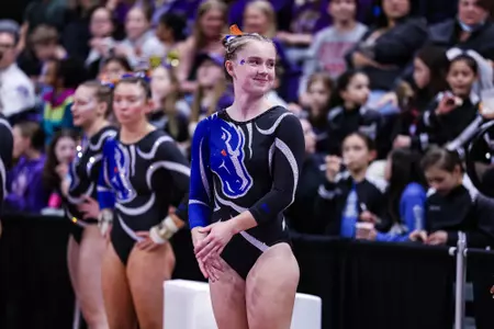 Bridget Kemp smiling and looking to the side.