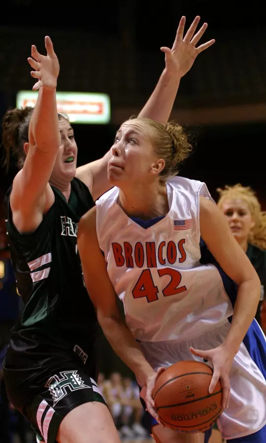 Heather Berry (Little) holds ball while being defended