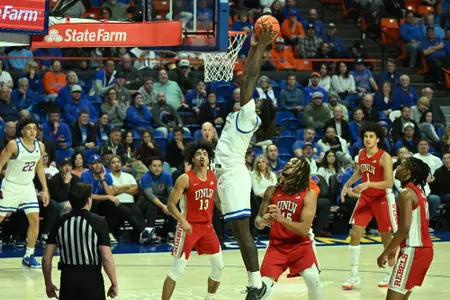 O'Mar Stanley dunks the ball against UNLV