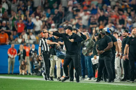 Spencer Danielson pointing on the sideline during the Fiesta Bowl