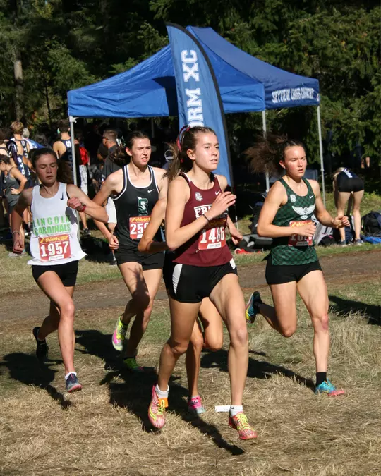 Kaiya Robertson running cross country in high school