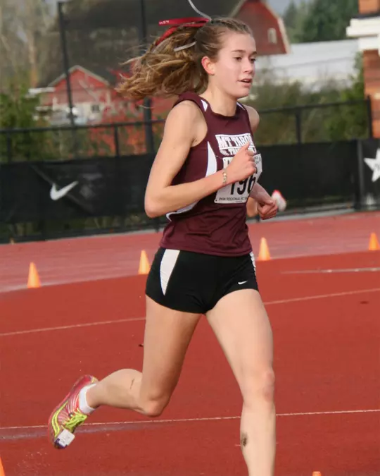 Kaiya Robertson running track in high school