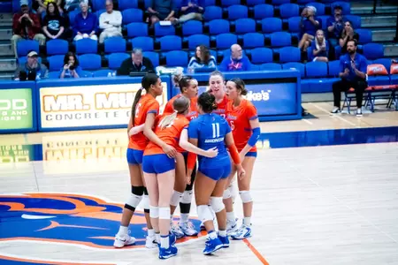 Team huddle at Bronco Gym.