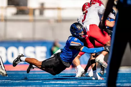 Ty Benefield makes a tackle against Fresno State.
