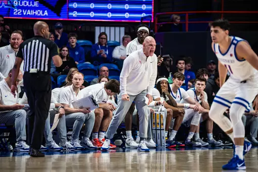 Associate Head Coach Mike Burns passionately talking on the sideline during Boise State's game against San Jose State last season.