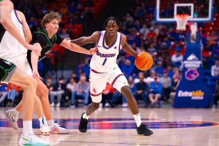 Aginaldo Neto dribbles the ball with his left hand against Utah Valley