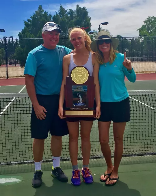 Corey Patton Lossner with her parents.