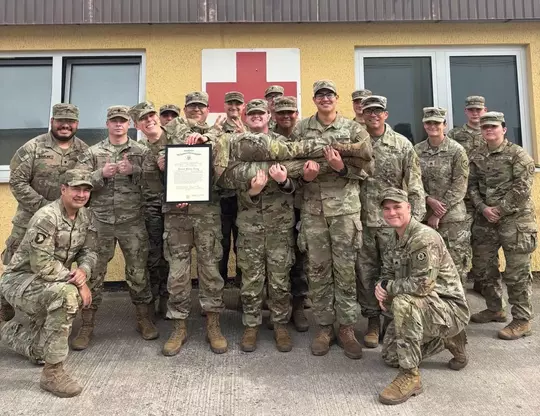 Corey Patton Lossner with her army group.