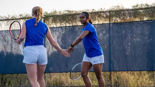 Corey Patton Lossner with a teammate.