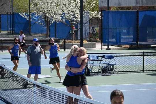 Corey Patton Lossner hugging her teammate.