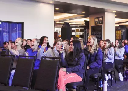 Boise State women's cross country celebrate during selection show.