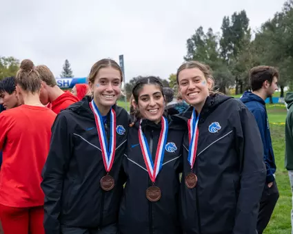 Kaiya Robertson, Bianca Boehnke and Amit Koma pictured after NCAA West Regional