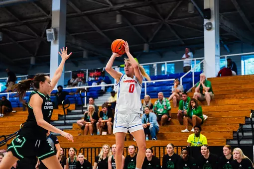 Tatum Thompson takes a jump shot against North Dakota.