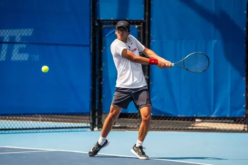 Avery Tallakson preparing to hit a backhand shot