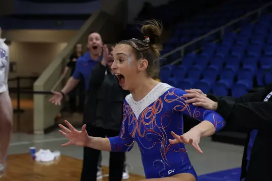 Anna Ferguson reacting to her 9.950 beam debut.