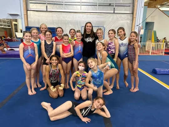 Anna Ferguson with her gymnastics class she coaches.