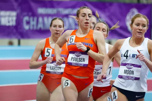 Brynnli Poulsen running at 2024 MW Indoor Championships.