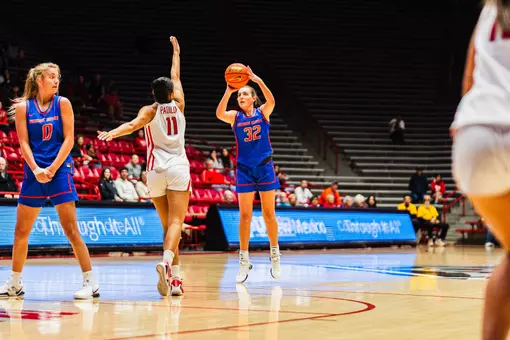 Natalie Pasco shooting the ball