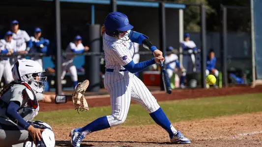 Mykenzie Hanna swings at a pitch against Saint Mary's, 2/9/25.