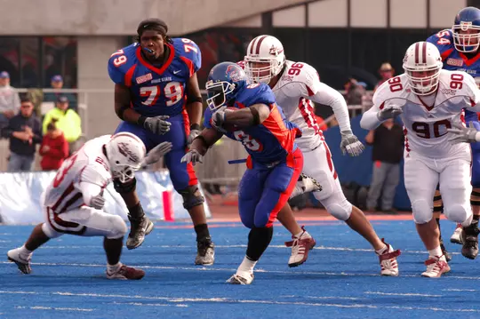 Ryan Clady blocking without helmet