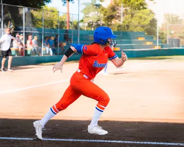 Megan Lake running to first base.