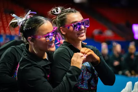 Emma Loyim and Alyssa Vulaj makes heart together.