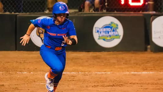 Sophia Knight runs to first base.