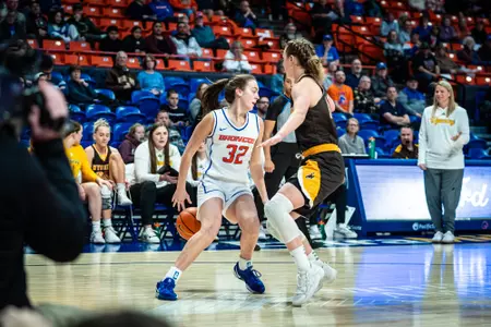 Natalie Pasco dribbling against Wyoming.