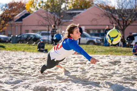 Summer McCann dives for a ball at the City of Trees Classic.