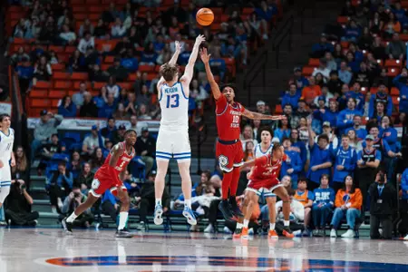 Andrew Meadow shoots a three on the right wing in a game against Fresno State at ExtraMile Arena