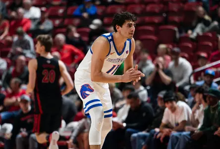 Alvaro Cardenas claps hands on the court during game vs. UNLV