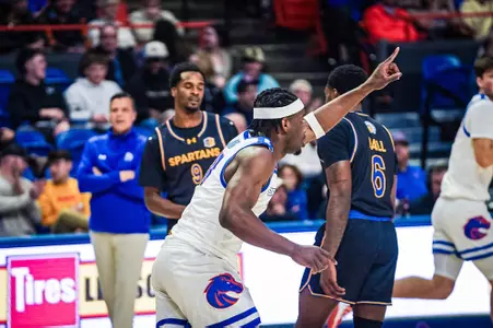 Emmanuel Ugbo celebrates after scoring a basket against San Jose State.