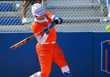 Sydney Groves swinging at a ball.