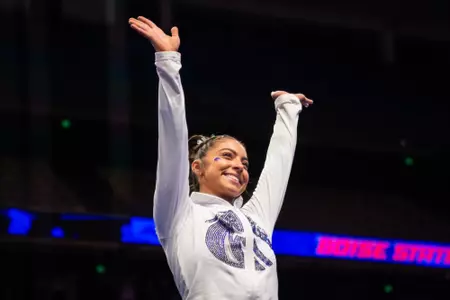 Emily Lopez smiling and waving
