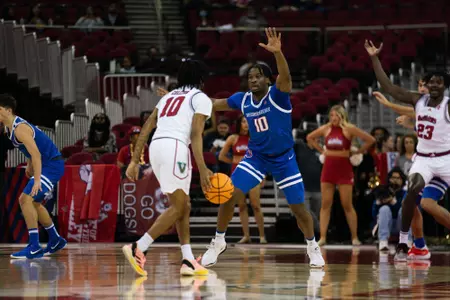 Emmanuel Ugbo plays defense on the perimeter against Fresno State