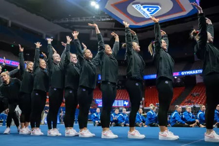 Gymnastics team saluting