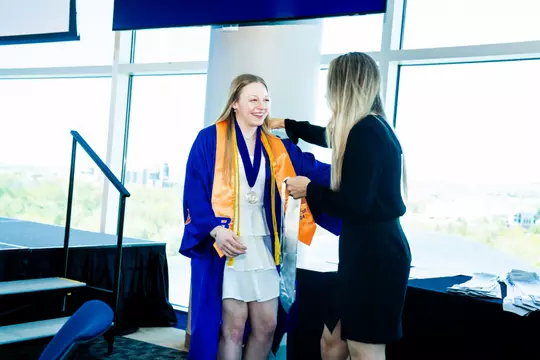 Elaina McGovern with Sarah Asla at student-athlete graduation