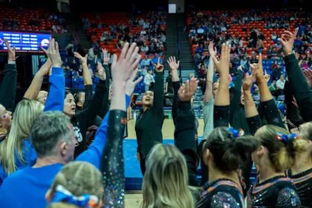 Gymnastics team breaking.