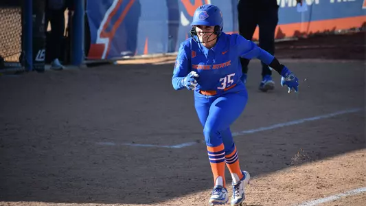 Leah McAnally runs from third base to home plate.