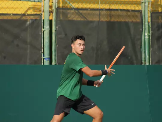 John Chin waiting to return a forehand shot during Davis Cup play.