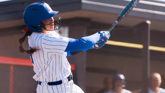 Makenzie Butt swings at a pitch.