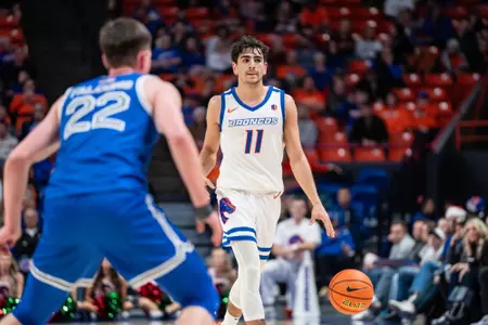 Alvaro Cardenas dribbles the ball up the floor against an Air Force defender at ExtraMile Arena