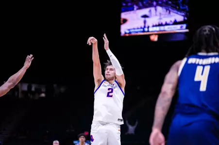Tyson Degenhart attempts a jump shot against George Washington