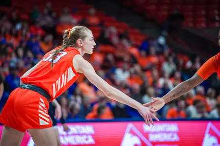 Abby Muse high-fiving