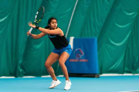Bhakti Shah preparing to hit a shot