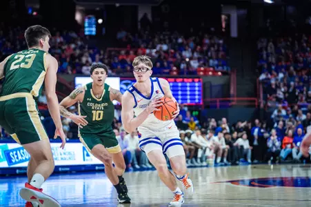 Andrew Meadow drives to the basket against Colorado State