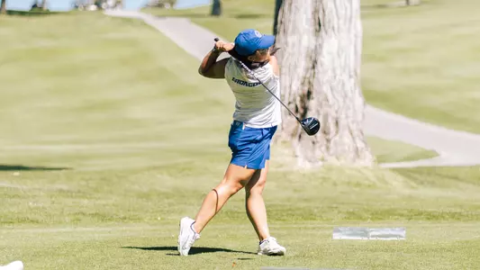 Jillian Hui taking a tee shot at the Silicon Valley Showcase