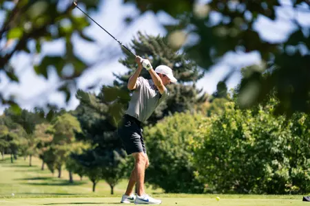 Cole Reuck takes a swing during practice