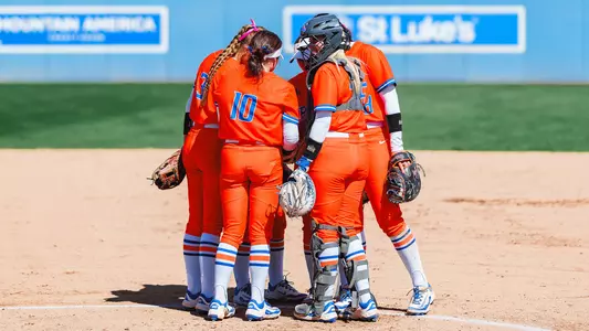 Players meeting in the circle.